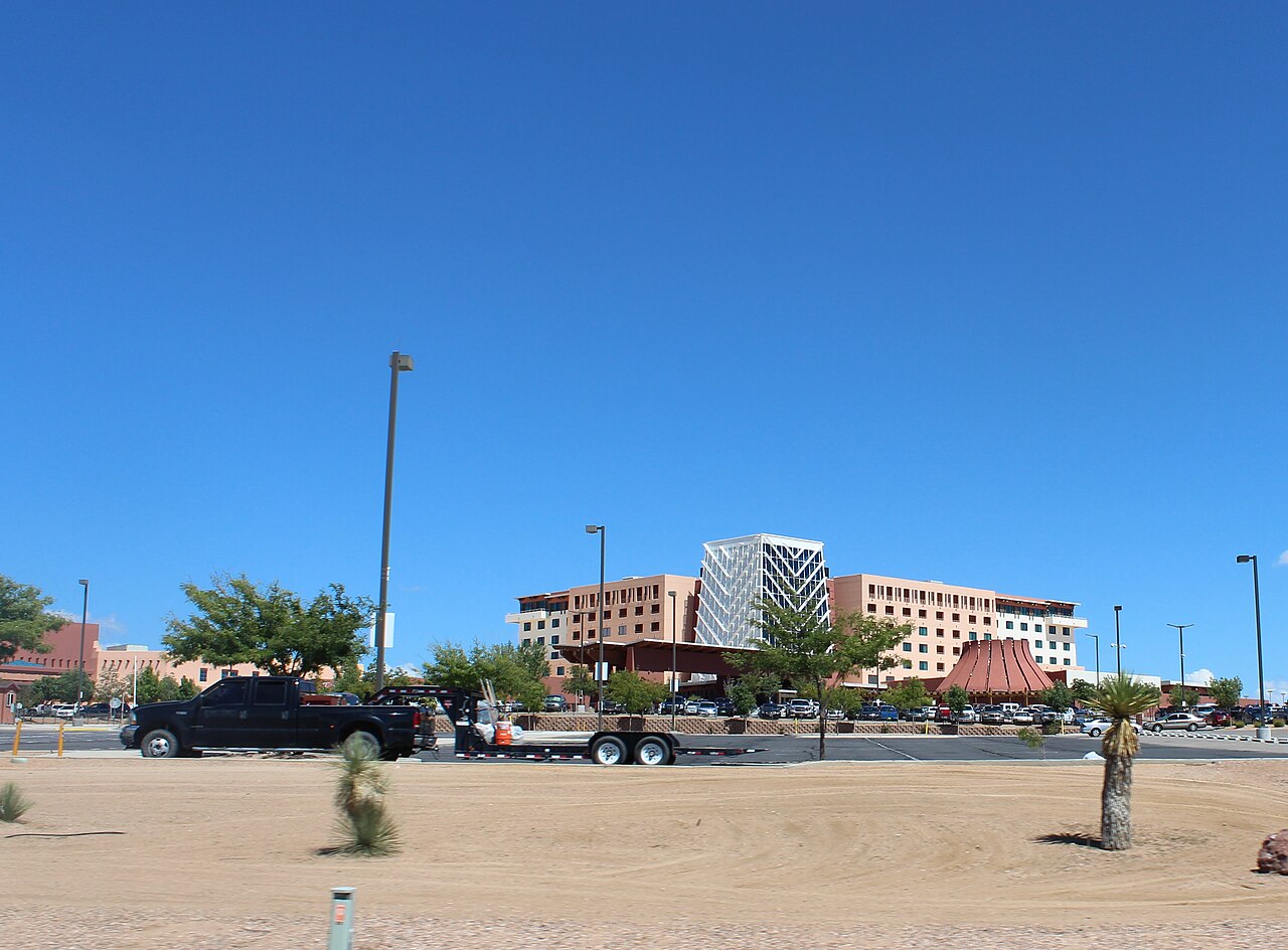 Historical exterior of Isleta Resort and Casino beneath a clear New Mexico sky